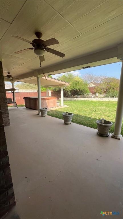 1004 Shady Hollow Ct, Nolanville, TX 76559 - view of patio with ceiling fan and a hot tub