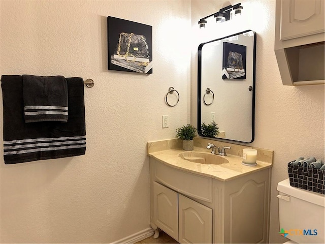 1004 Shady Hollow Ct, Nolanville, TX 76559 - bathroom with vanity and a textured wall