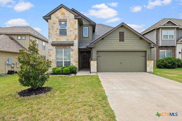 view of front of home featuring a garage, a front lawn, and central air condition unit