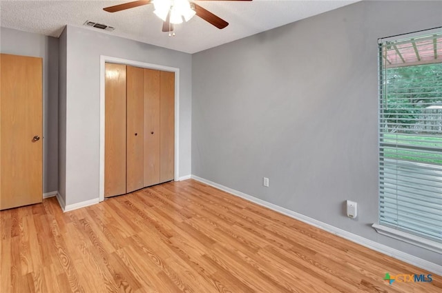 106 Hamlet Ct, Victoria, TX 77901 - unfurnished bedroom with light wood-type flooring, a closet, and ceiling fan
