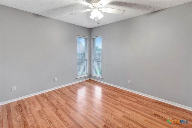 106 Hamlet Ct, Victoria, TX 77901 - spare room featuring light wood finished floors, a textured ceiling, and a ceiling fan