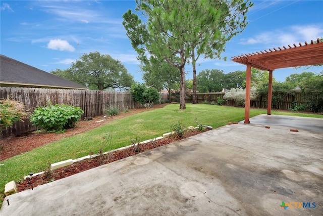 106 Hamlet Ct, Victoria, TX 77901 - fenced backyard featuring a pergola and a patio