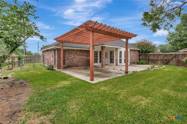 106 Hamlet Ct, Victoria, TX 77901 - rear view of property featuring a gate, a fenced backyard, a pergola, and brick siding