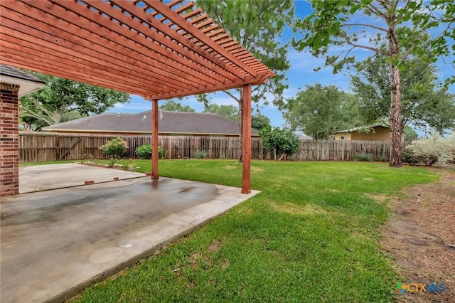 106 Hamlet Ct, Victoria, TX 77901 - fenced backyard with a pergola and a patio
