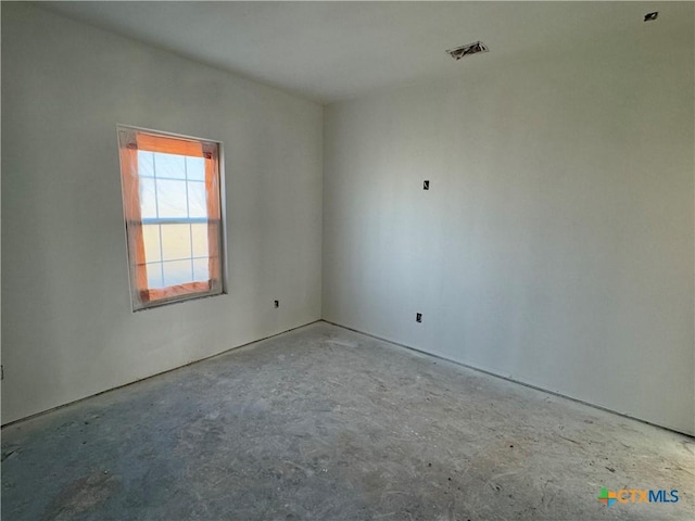 empty room featuring concrete floors