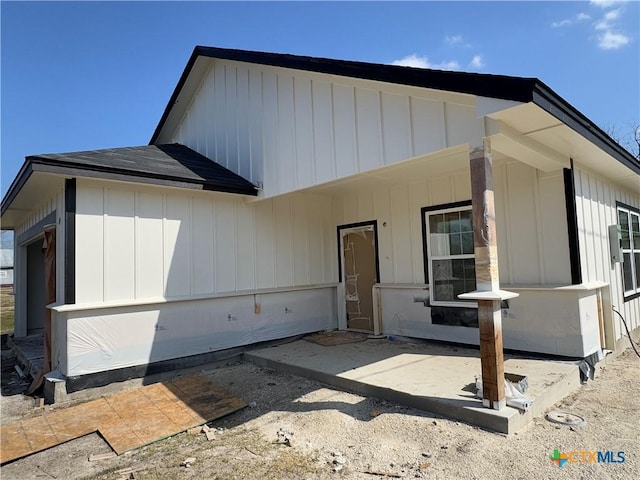 view of front of house with a patio area