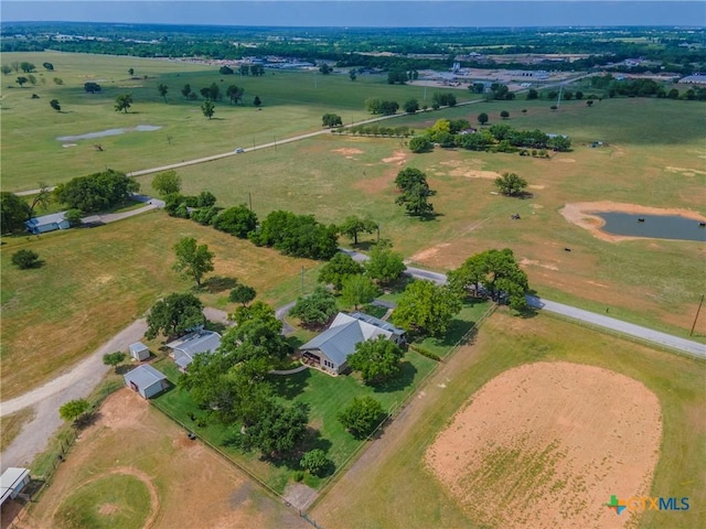 bird's eye view with a water view and a rural view