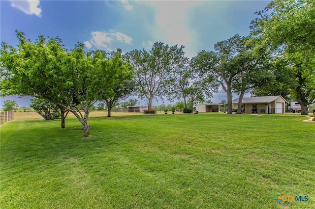 view of yard featuring fence