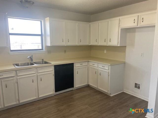 kitchen with sink, white cabinetry, a textured ceiling, black dishwasher, and dark hardwood / wood-style floors