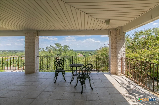 view of patio / terrace featuring a balcony