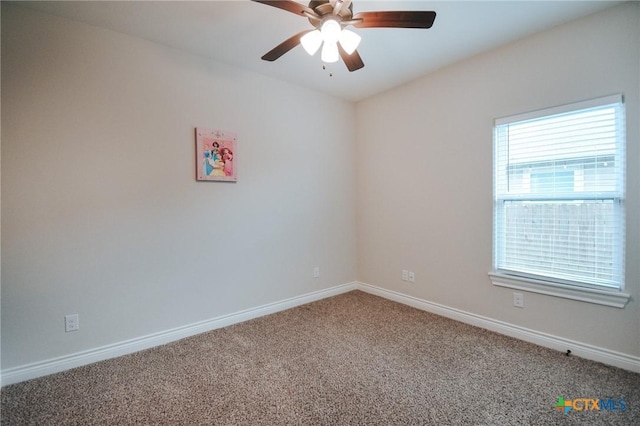 3611 Hanselman Rd, Victoria, TX 77901 - empty room featuring carpet floors, baseboards, and a ceiling fan