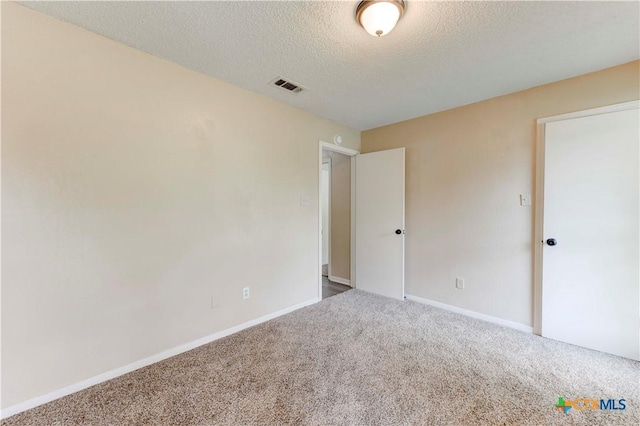 4812 Pepper Mill Holw, Killeen, TX 76542 - unfurnished bedroom featuring carpet flooring and a textured ceiling