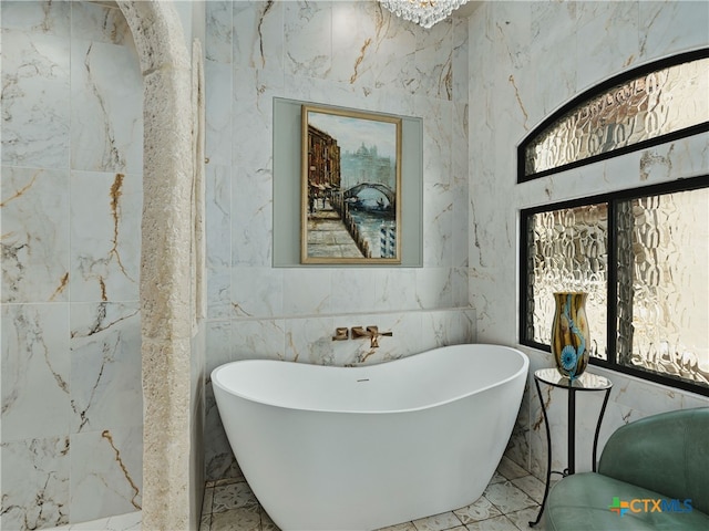 bathroom featuring a tub to relax in