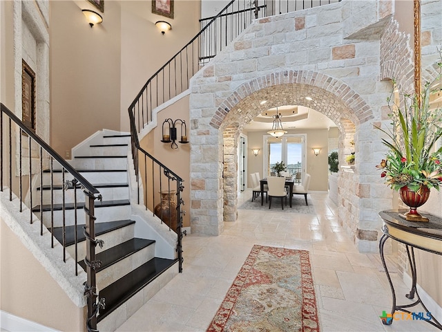 entrance foyer featuring a high ceiling