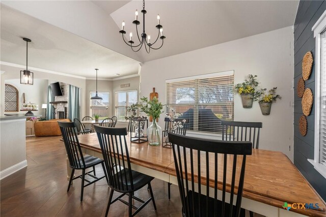2015 Th Jones Mill Way, Salado, TX 76571 - dining area with a chandelier, vaulted ceiling, wood finished floors, and ornamental molding