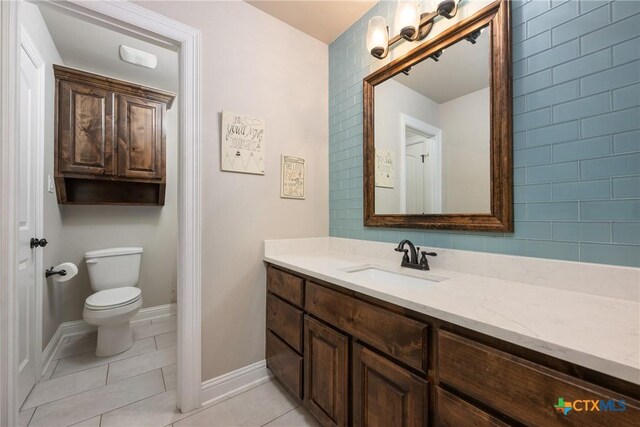 2015 Th Jones Mill Way, Salado, TX 76571 - bathroom with tile patterned flooring, toilet, vanity, and baseboards