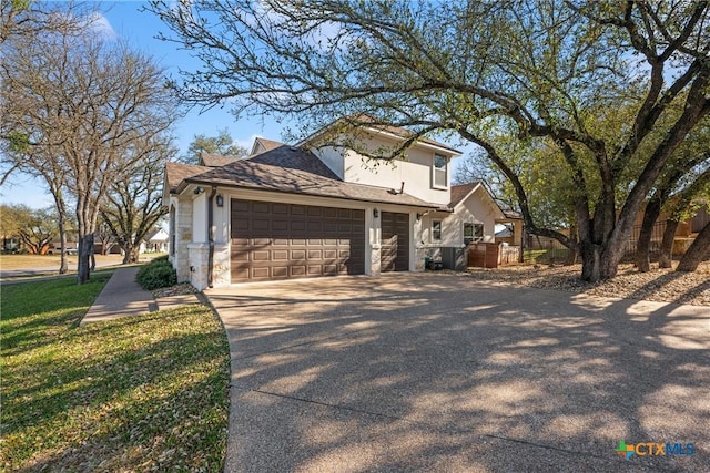 2015 Th Jones Mill Way, Salado, TX 76571 - view of front of house with an attached garage, concrete driveway, and stone siding
