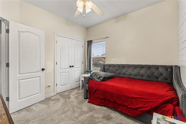 bedroom with carpet floors and a ceiling fan