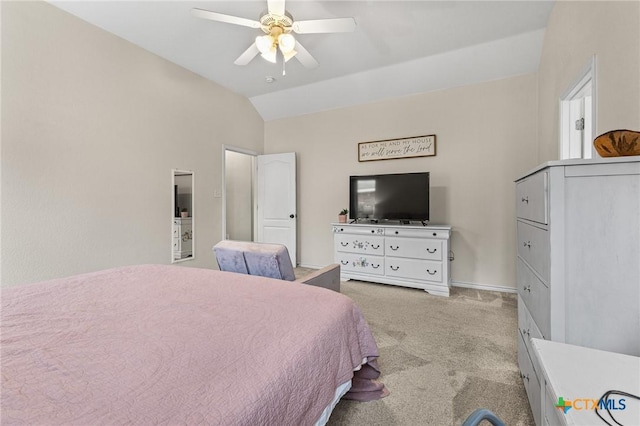 bedroom featuring vaulted ceiling, carpet flooring, baseboards, and ceiling fan