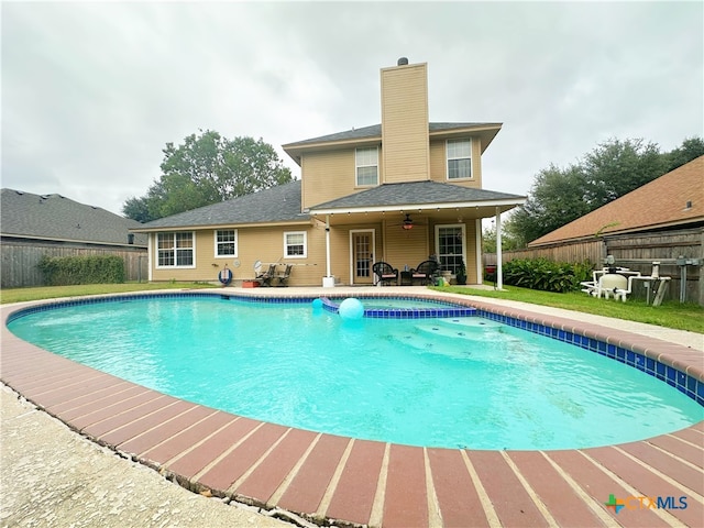 view of pool featuring a patio area