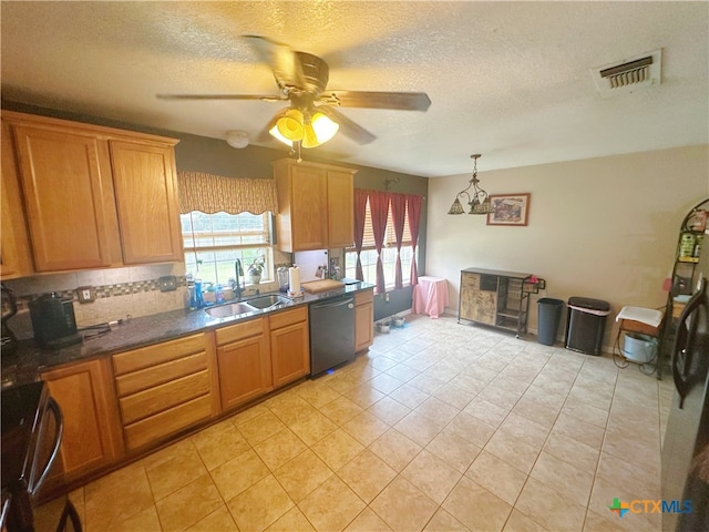 kitchen with sink, ceiling fan, a textured ceiling, light tile patterned floors, and black dishwasher