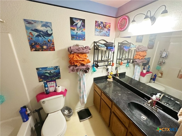 full bathroom featuring vanity, shower / tub combination, and toilet