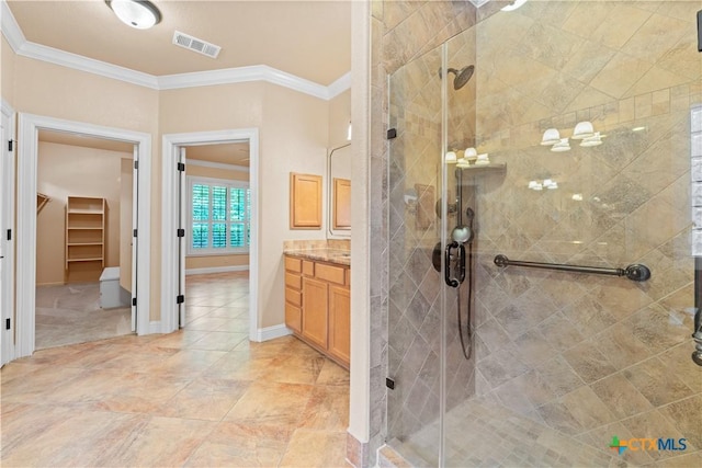 full bath with vanity, visible vents, crown molding, and a stall shower