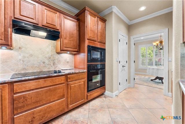 kitchen featuring backsplash, crown molding, light tile patterned flooring, under cabinet range hood, and black appliances