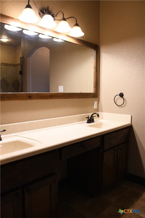 bathroom featuring vanity and tile patterned floors