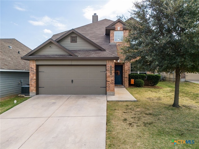 view of front of house featuring a garage, concrete driveway, cooling unit, a front yard, and brick siding