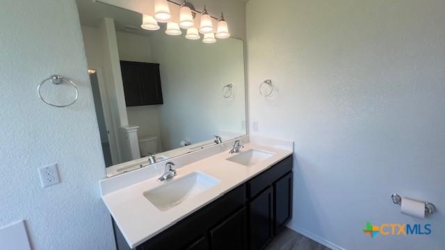 249 Bethann Dr, Temple, TX 76502 - full bath with double vanity and toilet