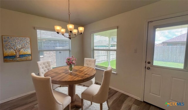 249 Bethann Dr, Temple, TX 76502 - dining space featuring a chandelier and dark wood finished floors