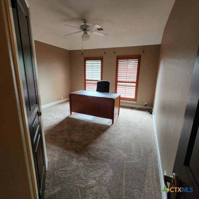 unfurnished office with light colored carpet and ceiling fan