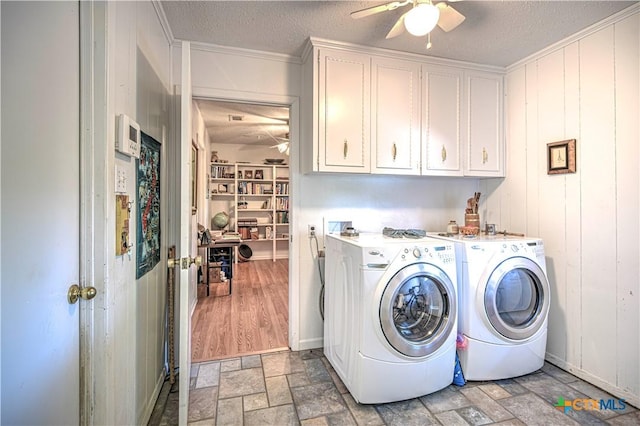 4701 Hickory Rd, Temple, TX 76502 - laundry room featuring ceiling fan, separate washer and dryer, cabinet space, ornamental molding, and a textured ceiling