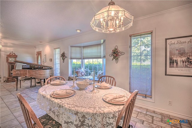 4701 Hickory Rd, Temple, TX 76502 - dining room featuring a chandelier, crown molding, baseboards, and a textured ceiling