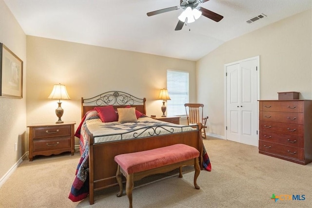 bedroom featuring visible vents, baseboards, a ceiling fan, vaulted ceiling, and light colored carpet