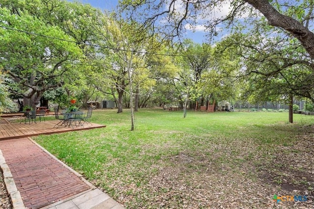 view of yard featuring a deck
