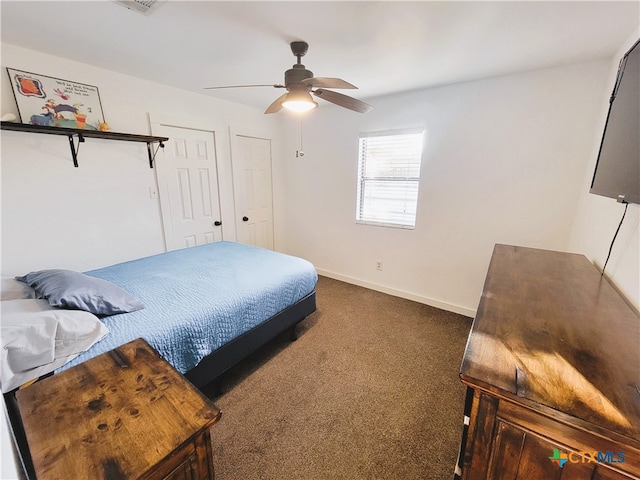 carpeted bedroom featuring ceiling fan