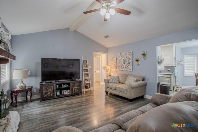 111 Lexington Ln, Victoria, TX 77901 - living area with vaulted ceiling with beams, visible vents, baseboards, a ceiling fan, and wood finished floors