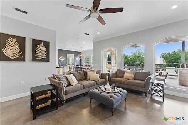 810 Pinnacle Pkwy, New Braunfels, TX 78132 - living room with concrete flooring, ceiling fan, ornamental molding, baseboards, and recessed lighting