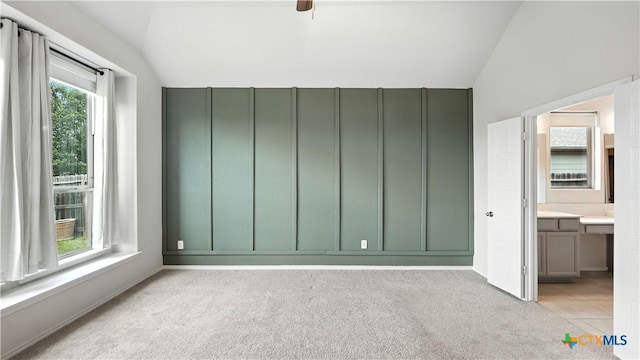 3938 Legend Park, New Braunfels, TX 78130 - unfurnished bedroom featuring lofted ceiling and light carpet