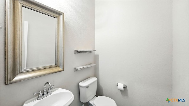 3938 Legend Park, New Braunfels, TX 78130 - half bath featuring a sink and toilet