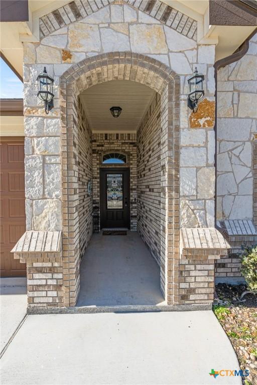 entrance to property with a garage