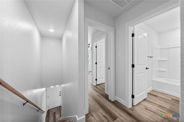 1013 S 26th St, Temple, TX 76501 - hall with wood finished floors and baseboards