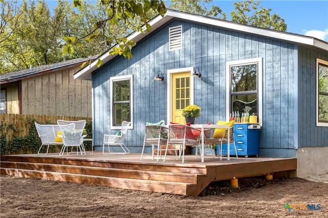 rear view of house with a deck