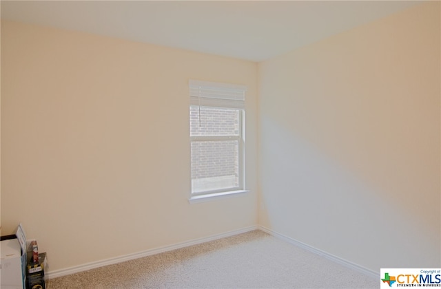 view of carpeted spare room