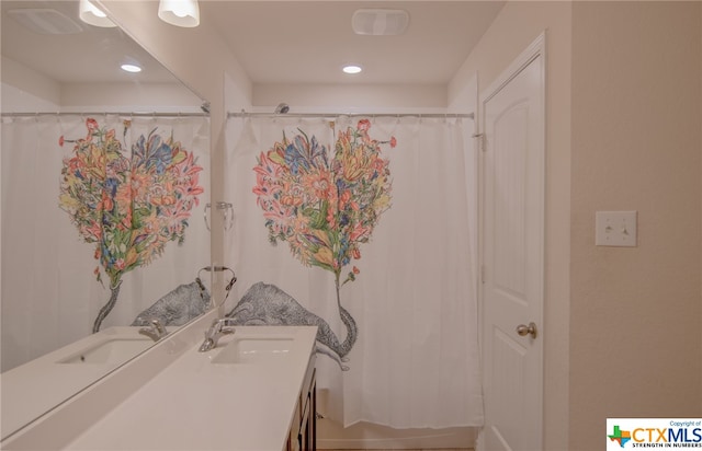 bathroom featuring vanity