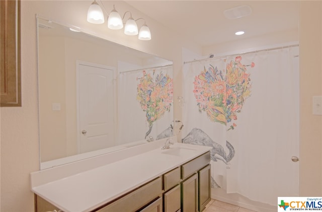 bathroom featuring vanity and tile patterned floors