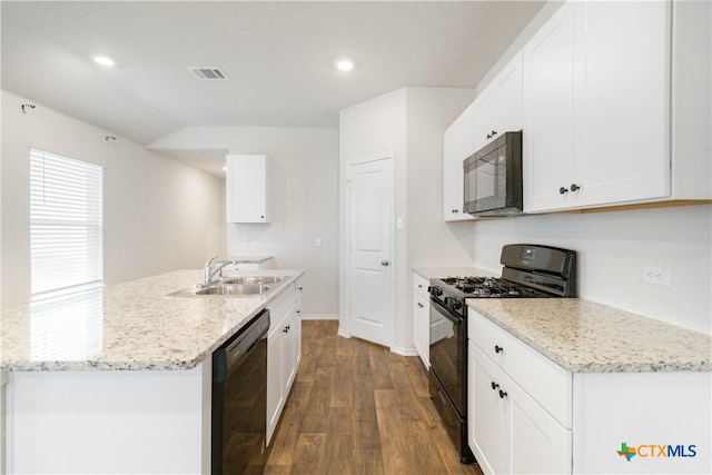 kitchen featuring light stone countertops, dark hardwood / wood-style floors, white cabinetry, and black appliances