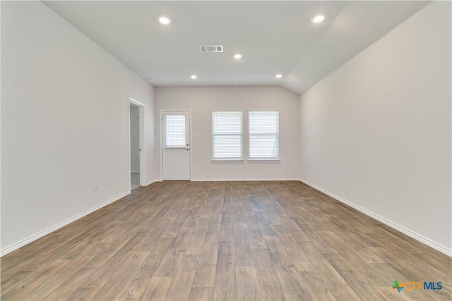 2969 Wolfcreek, New Braunfels, TX 78130 - spare room featuring wood finished floors, recessed lighting, and baseboards